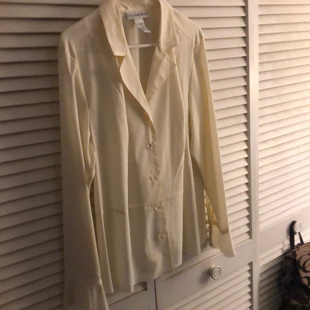 Cream colored very light weight blouse size 14